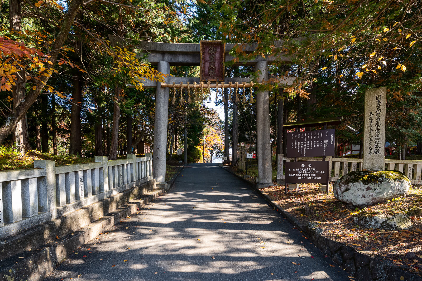 Stone torii at the side entrance at Fuji Omuro Sengen Shrine