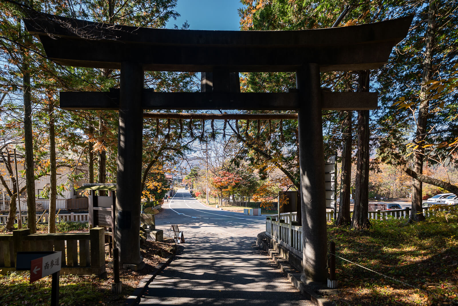 Large torii viewed from inside toward the road at Fuji Omuro Sengen Shrine