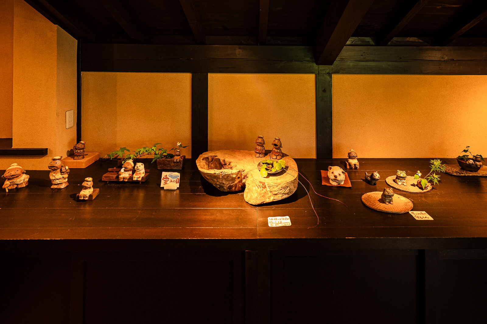 Handcrafted ceramic artwork displayed inside the Kitakamakura Old Folk House Museum in Kita-Kamakura