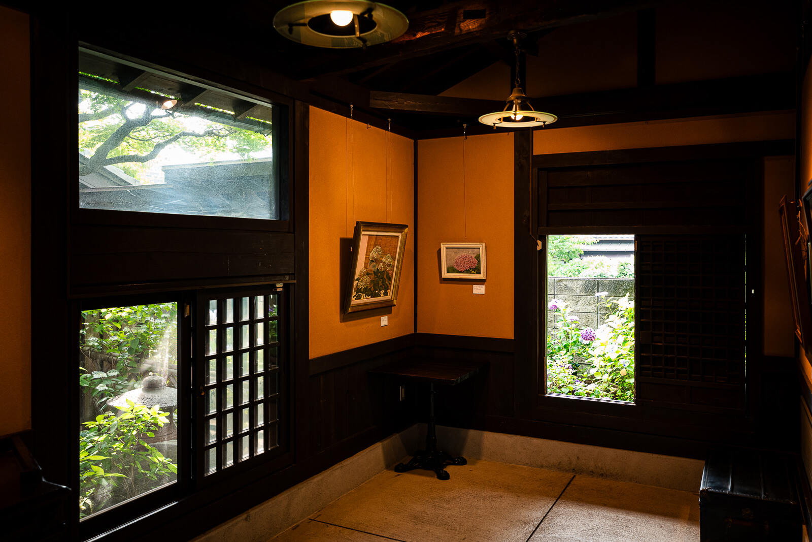Traditional room with garden views inside the Kitakamakura Old Folk House Museum