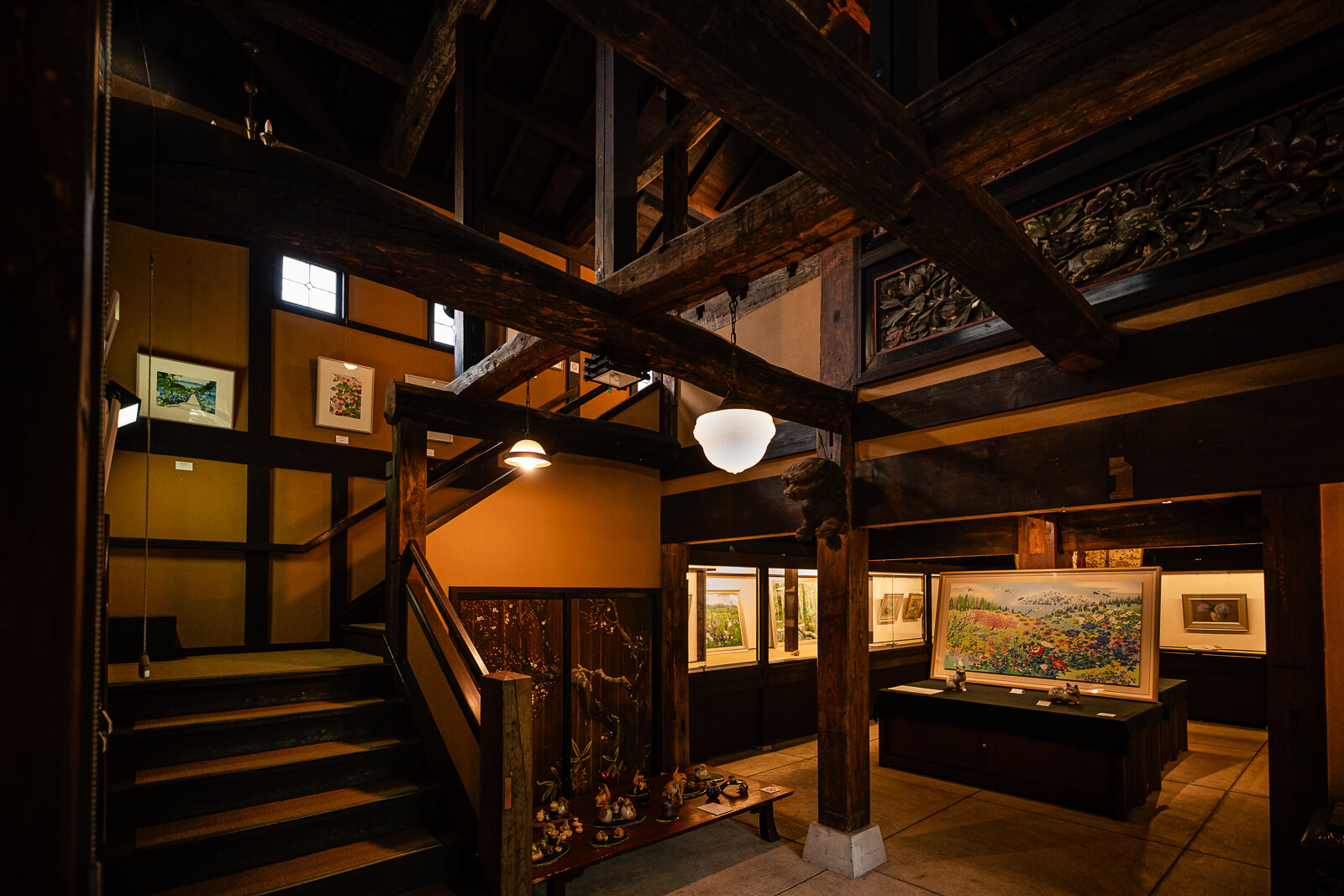 Upper gallery and exposed timber beams inside the Kitakamakura Old Folk House Museum