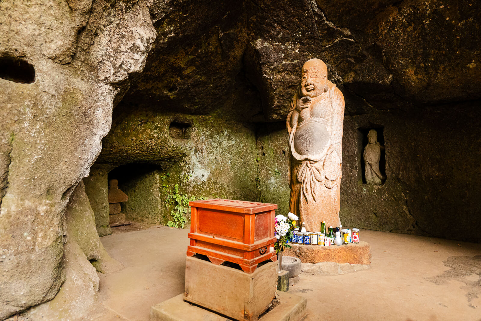 Statue of Hotei-son inside a cave at Jōchi-ji Temple