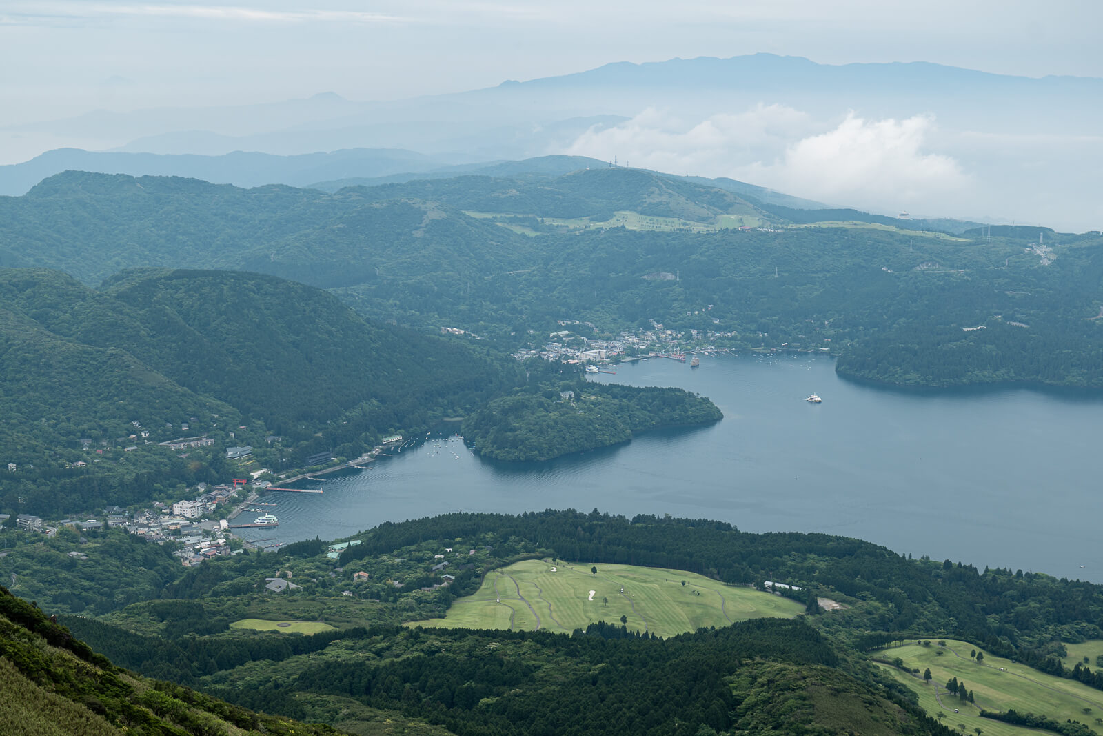 Shoreline and pleasure boat ports along Lake Ashi viewed from Hakone Komagatake Ropeway