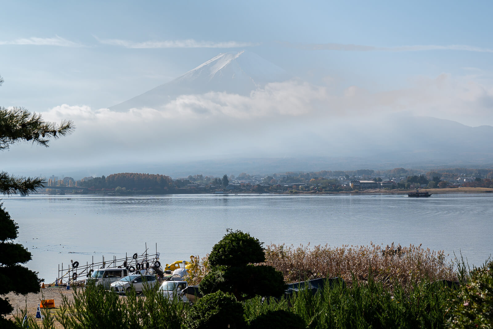 Mount Fuji beyond the lake with some cloud at Kawaguchiko Maple Corridor area