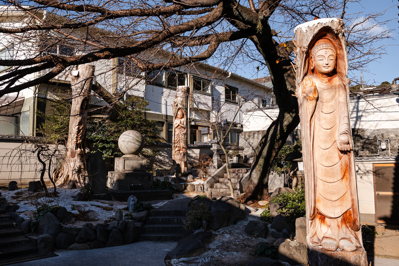Wooden statue within the courtyard at Onsen-ji Temple, Atami, Shizuoka