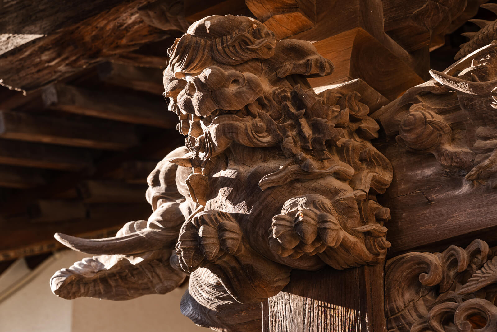 Carved wooden architectural detail at Onsen-ji Temple, Atami, Shizuoka