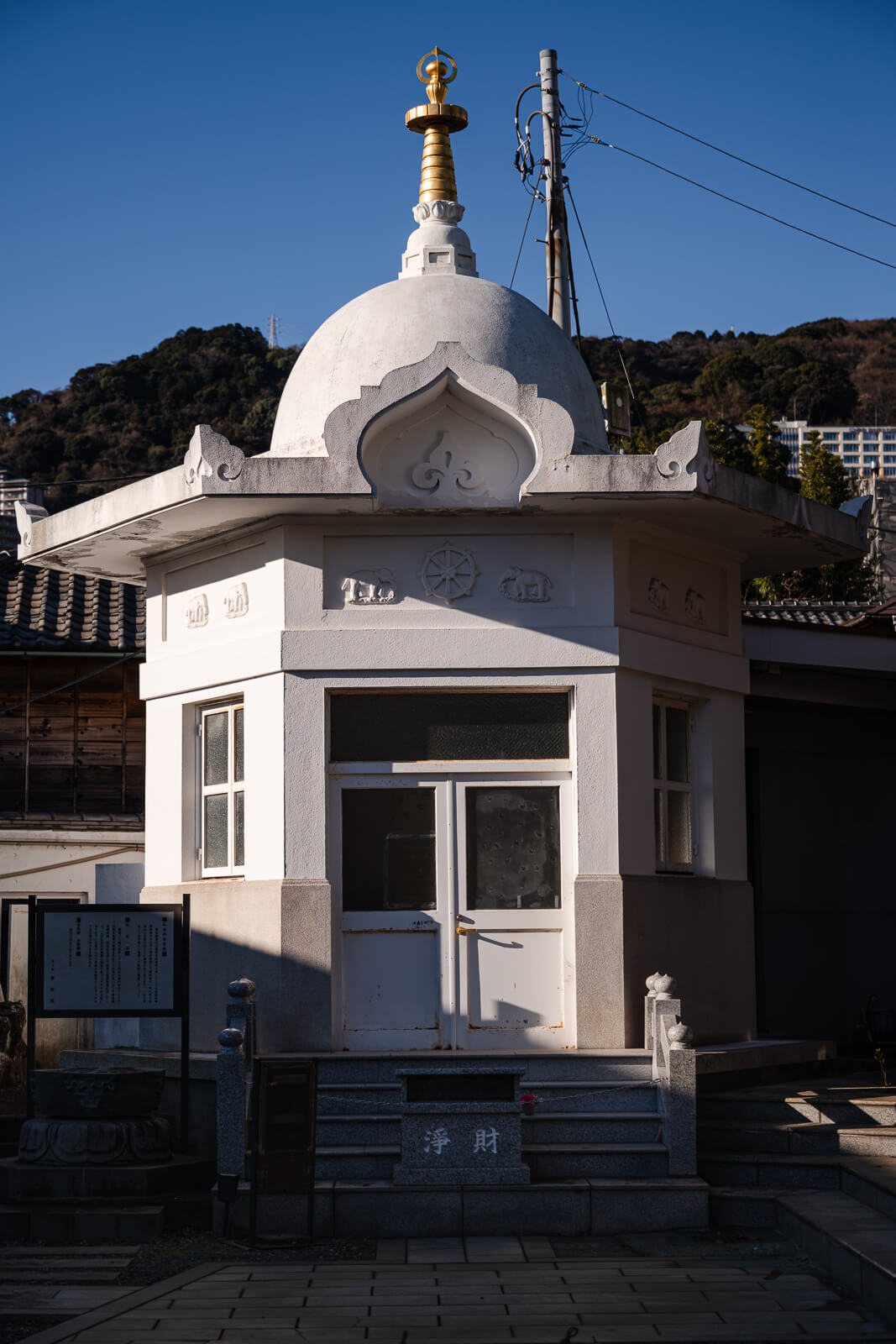 White domed devotional structure with gold finial at Seigon-in Temple