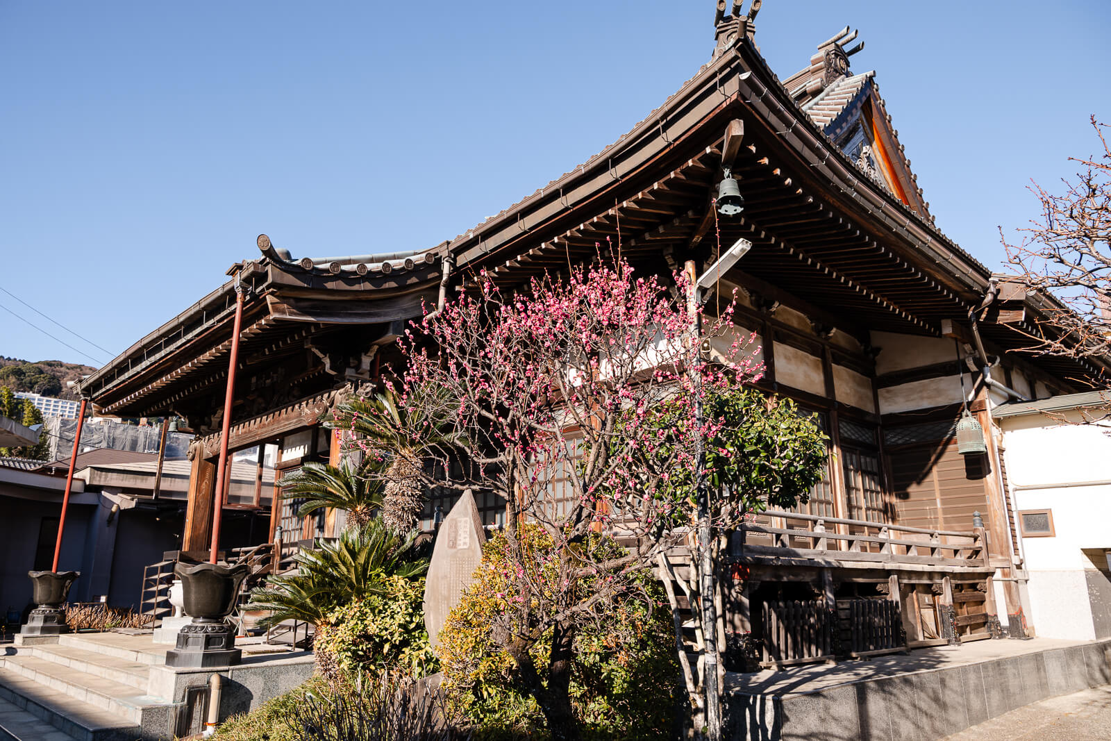 Wooden main hall at Seigon-in Temple with courtyard foreground