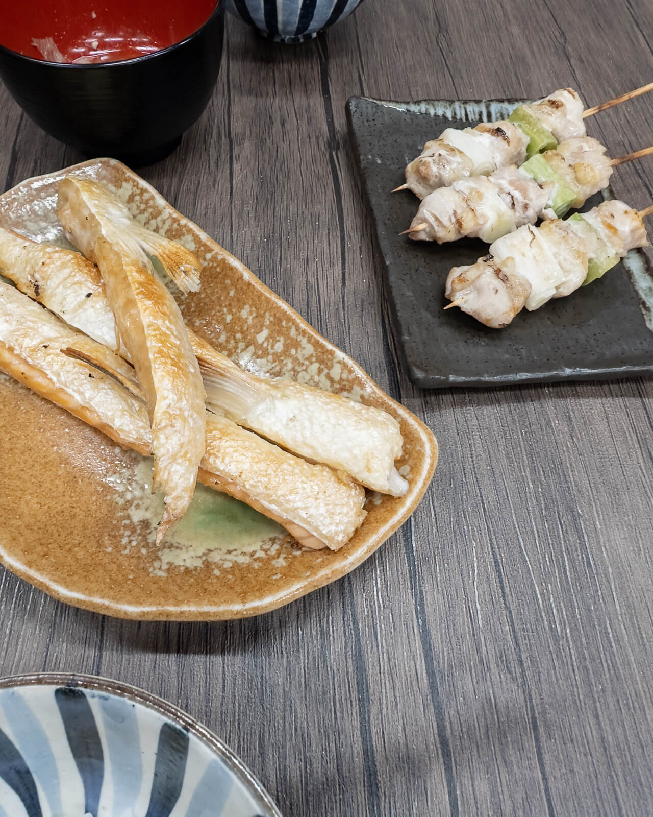 Grilled skewers and fish at a local restaurant near Atami Heiwa-dōri Shopping Street in Atami, Shizuoka