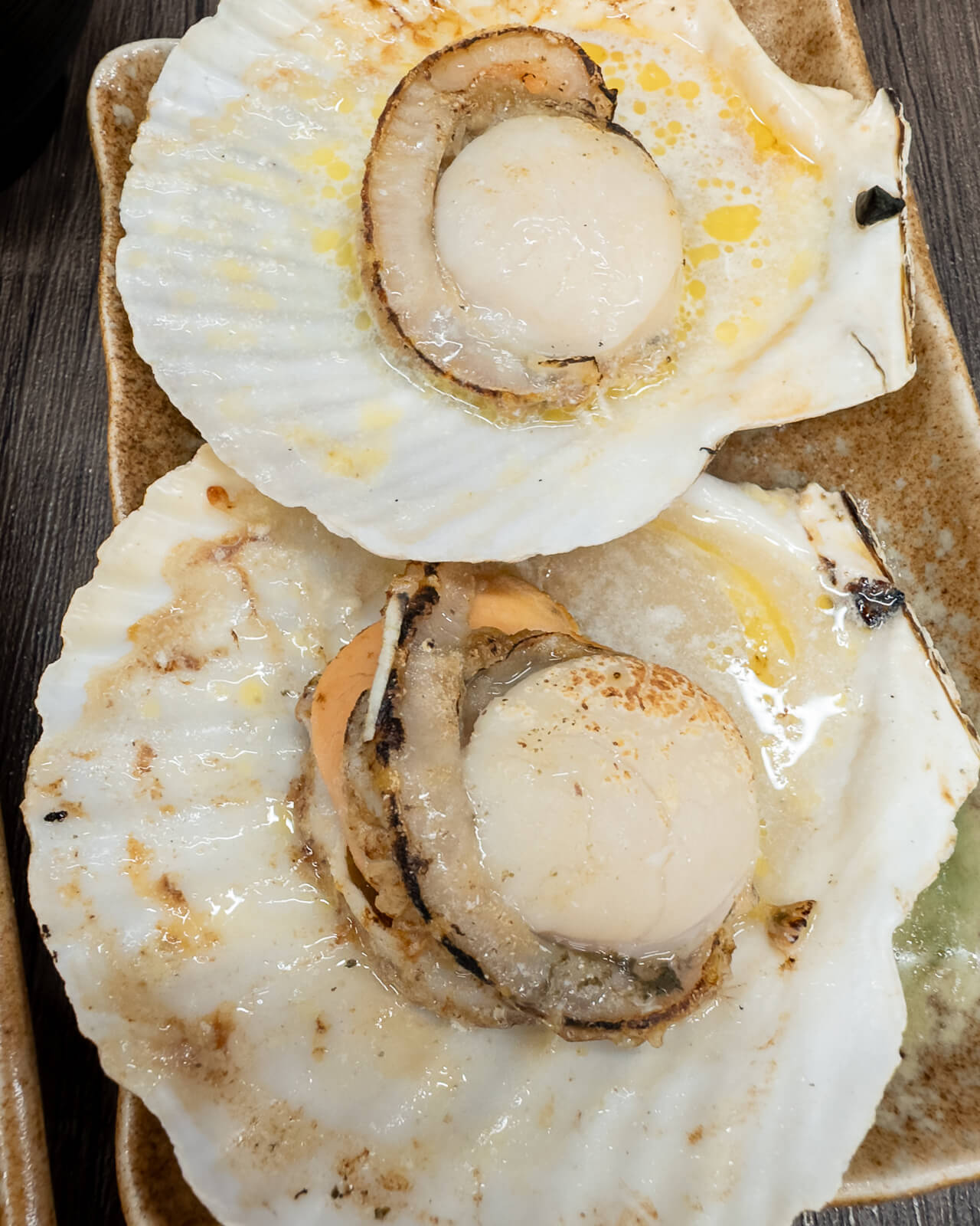 Grilled scallops at a local restaurant near Atami Heiwa-dōri Shopping Street in Atami, Shizuoka