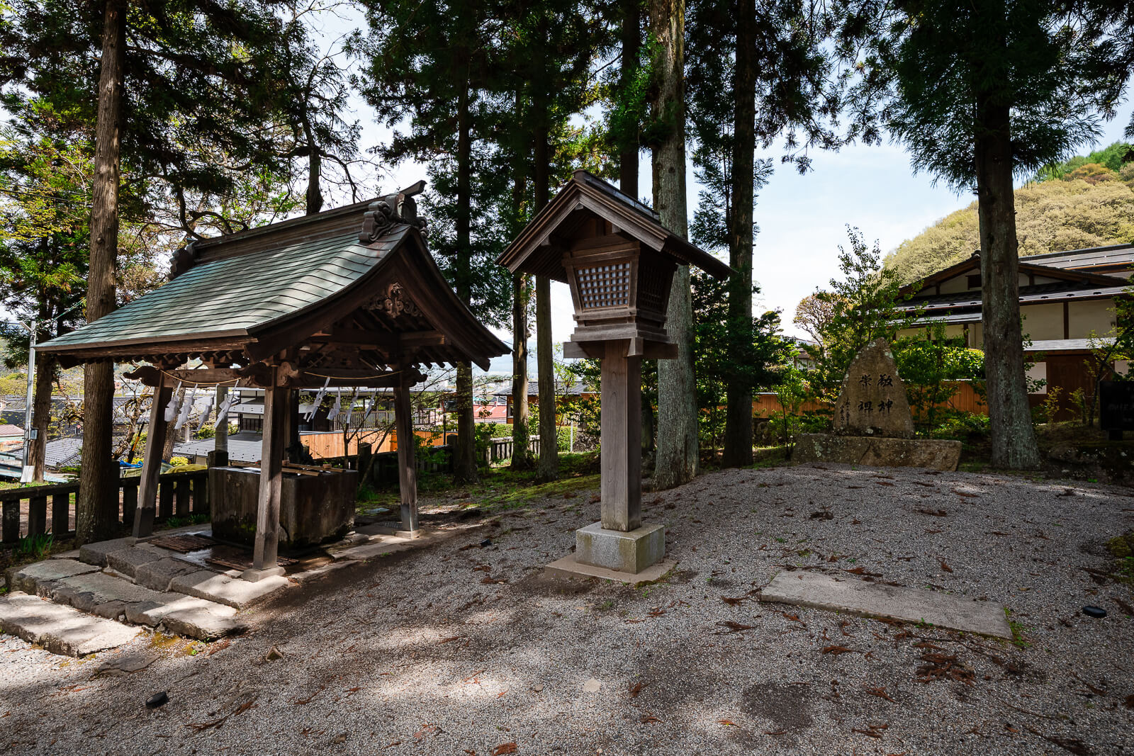 Open shrine grounds and pathway area at Suwa Taisha Kamisha Maemiya in Chino, Nagano