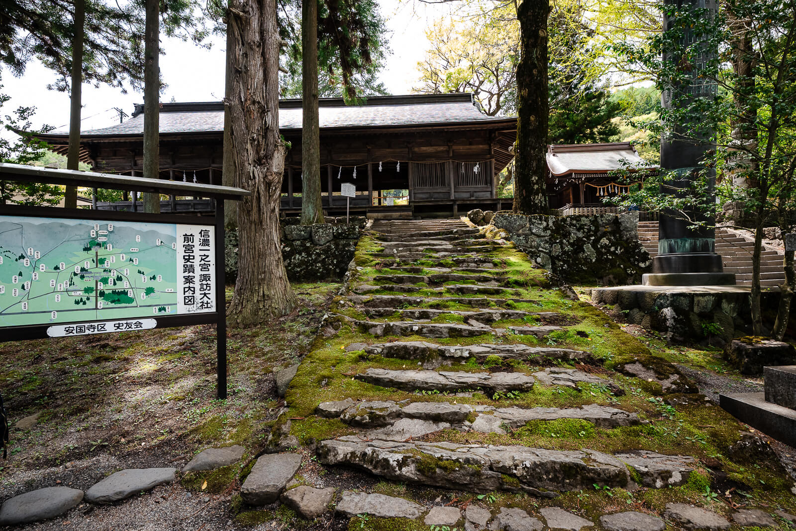 Stone staircase leading toward the Jukkenro hall at Suwa Taisha Kamisha Maemiya in Nagano