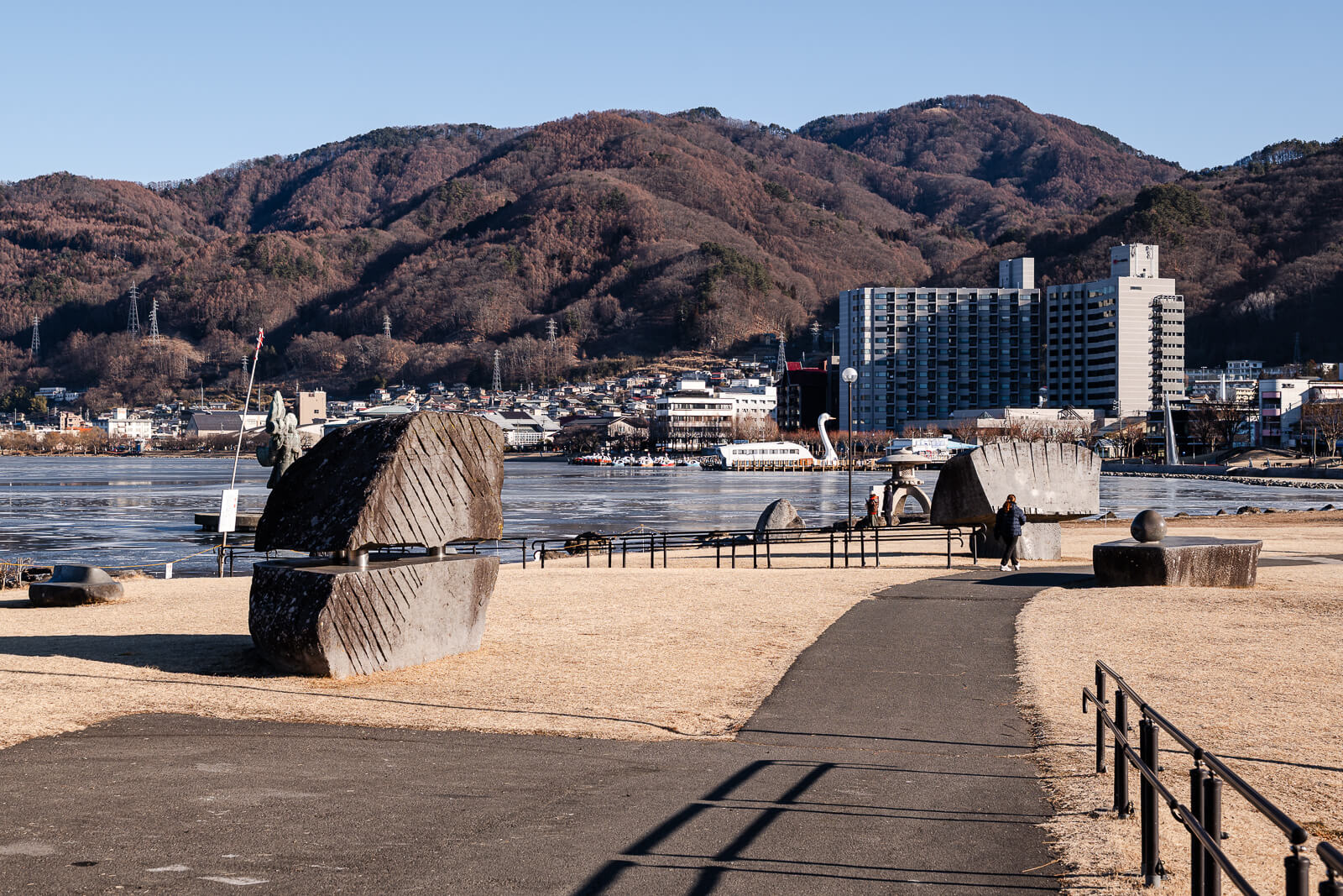 Lakeside edge and stone structure at Sekicho Park along Lake Suwa Nagano