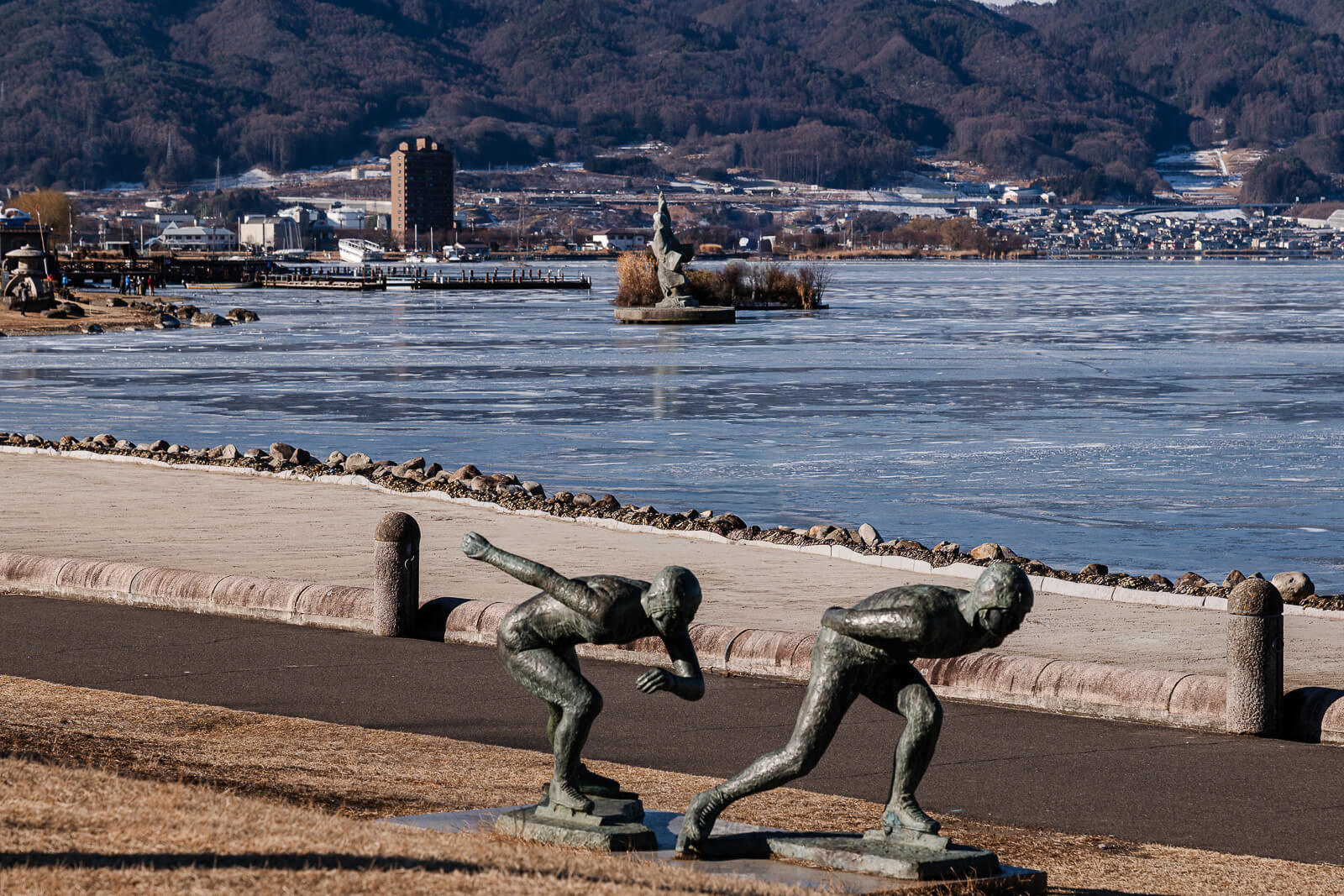 Ice skating statues along the walking path at Sekicho Park in Suwa Nagano