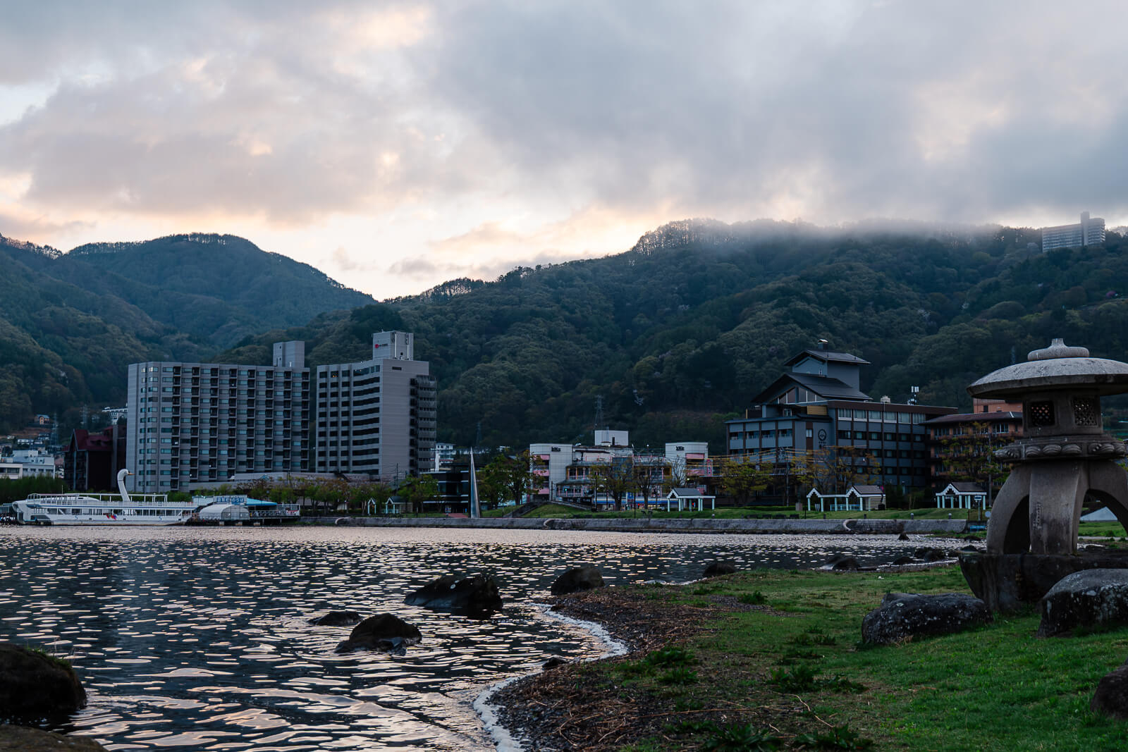 a view from the shore of Lake Suwa towards kamisuwa onsen town