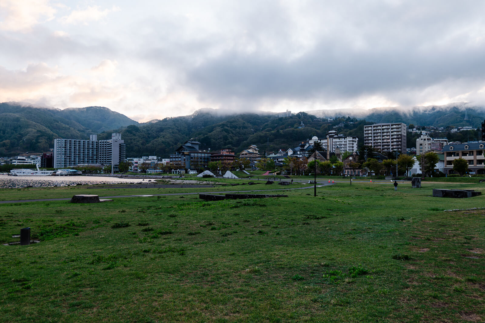 Open lawn areas extend inland from the shoreline.