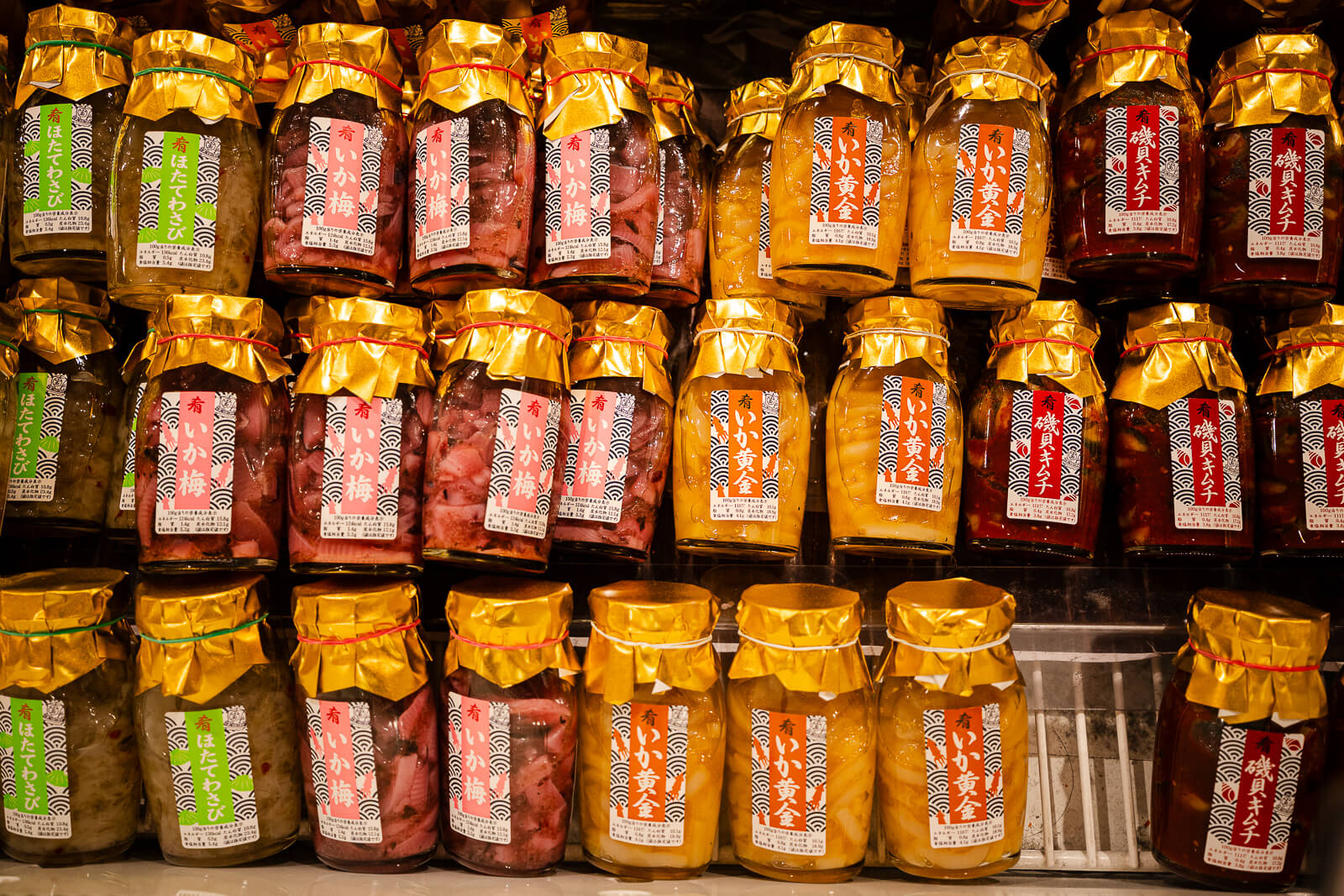 Jars of preserved seafood condiments at TOTOCO Odawara market