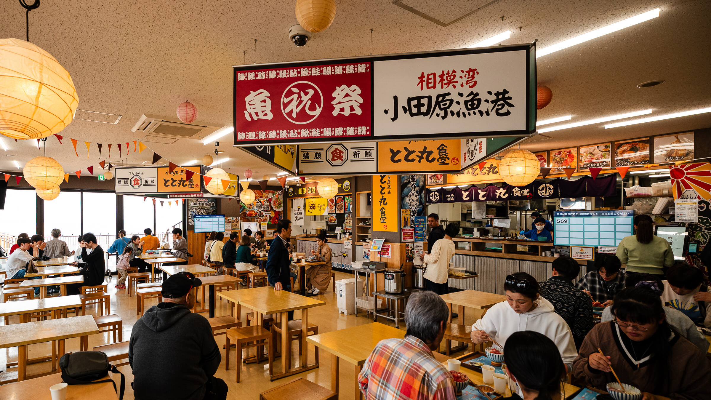 Visitors dining inside the food hall at TOTOCO Odawara, Odawara