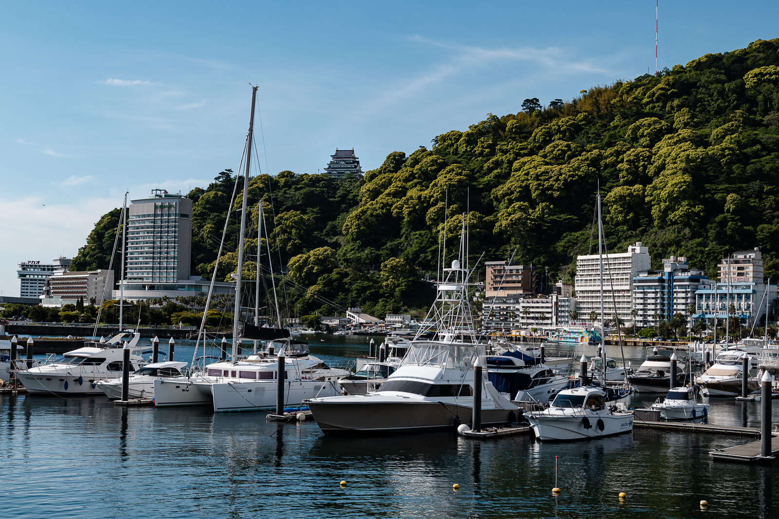 view of Atami Castle from the harbor park and moon terrace area in Shizuoka