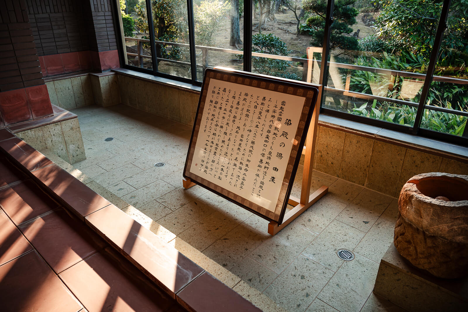 Historic bathing room preserved inside Kiunkaku villa overlooking the garden in Atami