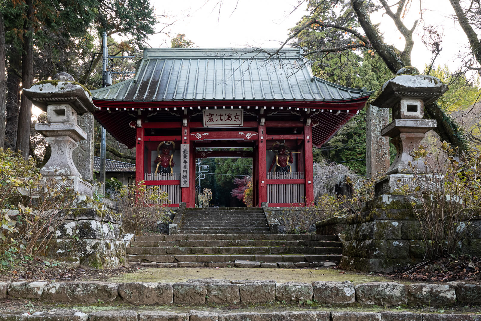 Main Guardian Gate at the forest approach to Daiyuzan Saijoji Temple