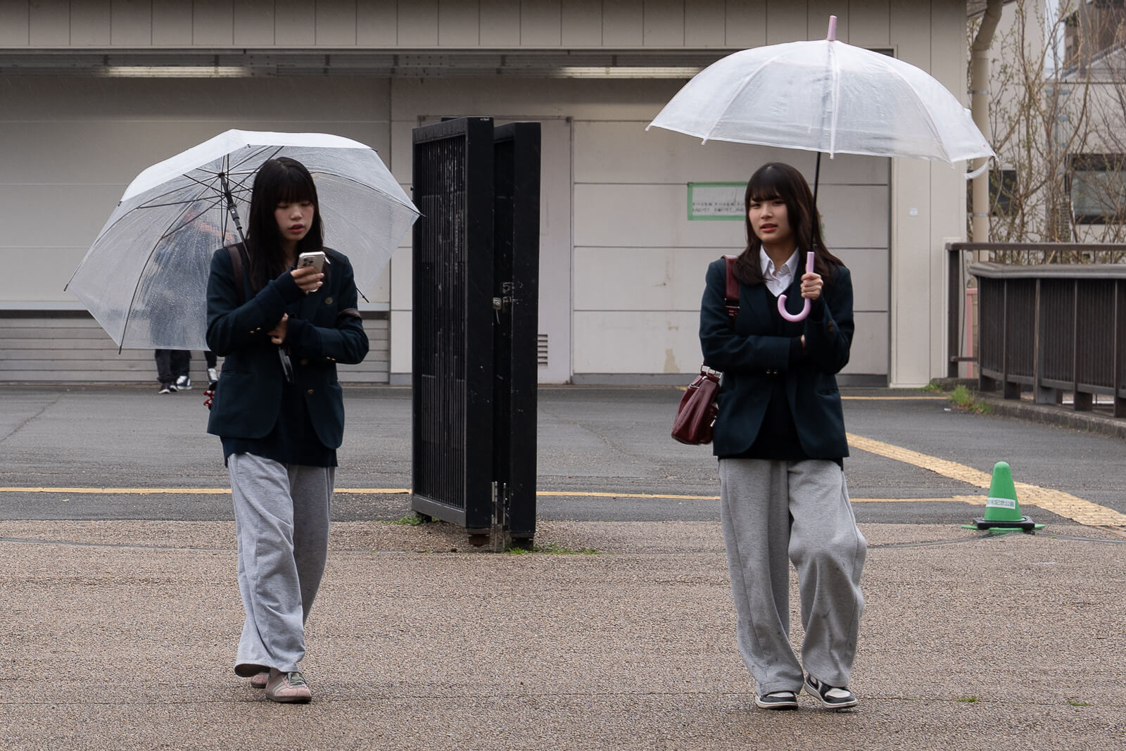 girl using phone outside train station affiliate placement eSIM