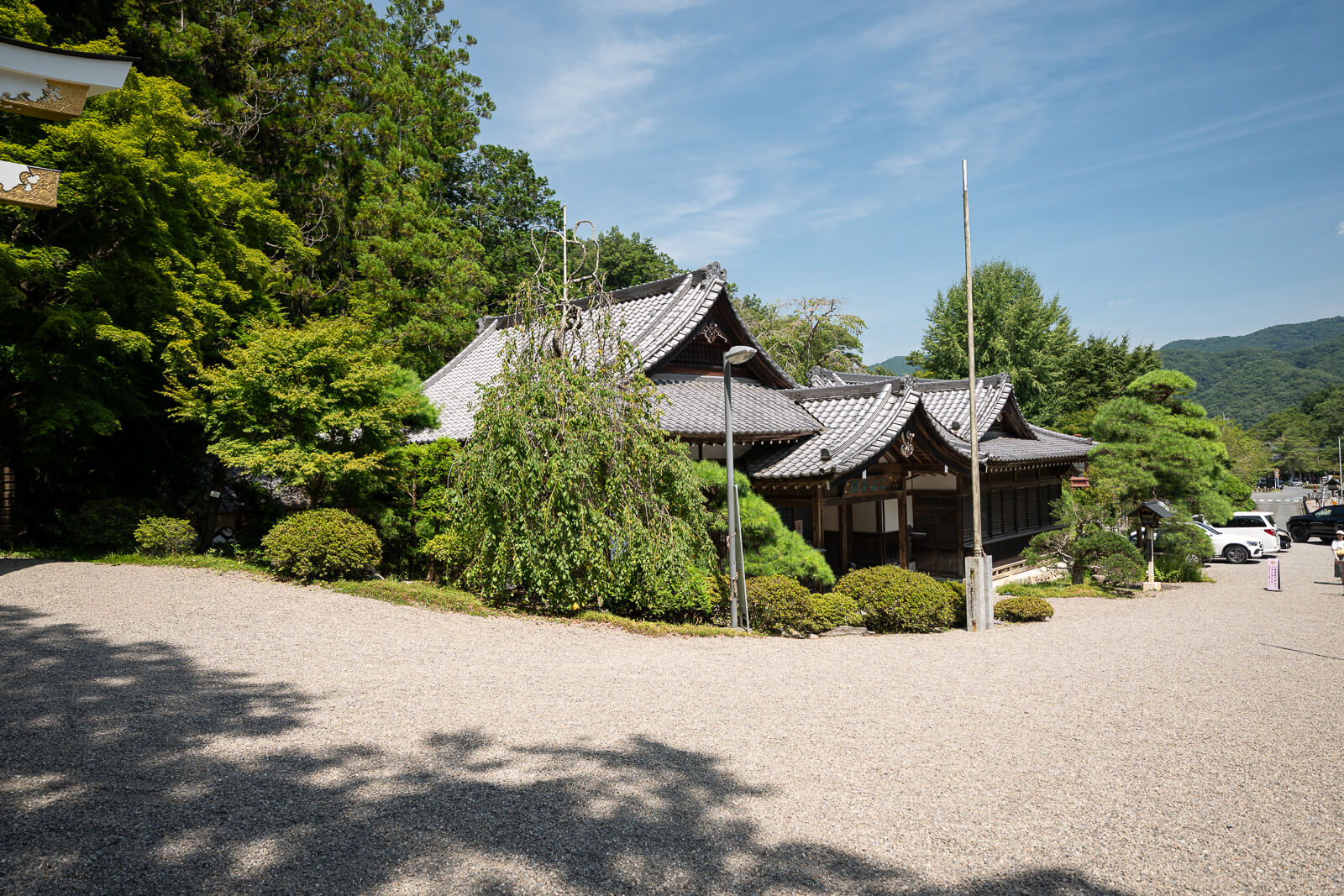 Open shrine grounds and surrounding forest at Hodosan Shrine in Nagatoro