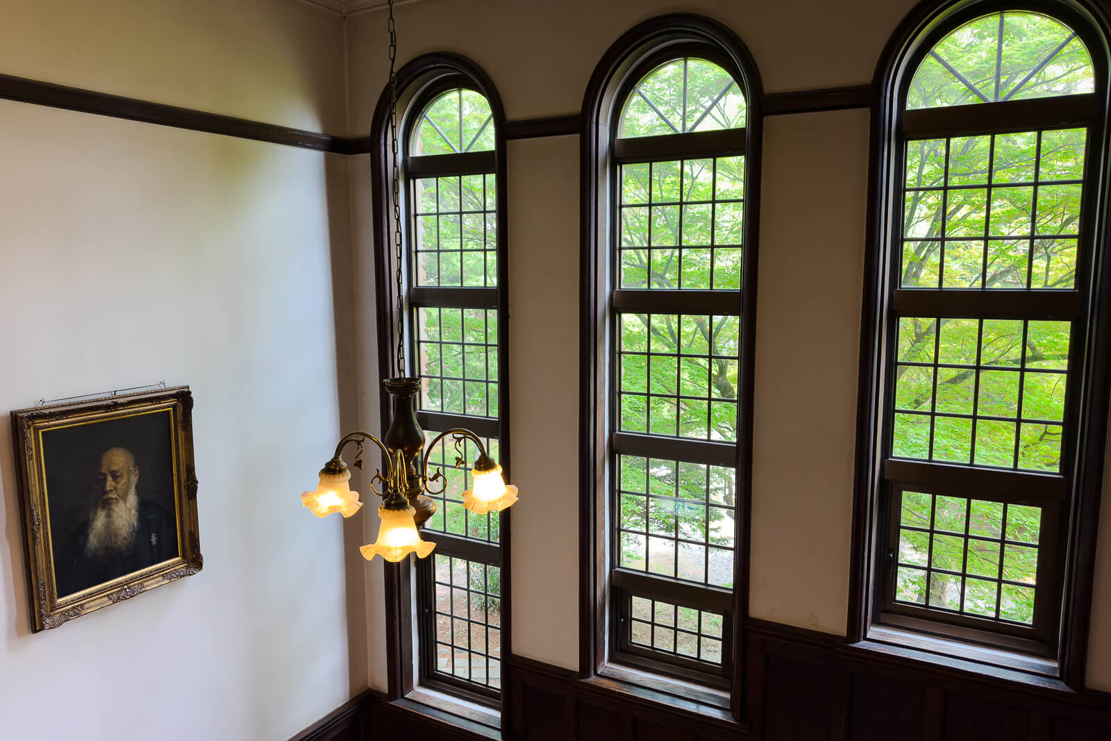 Tall arched windows inside Katakurakan public bathhouse near Lake Suwa