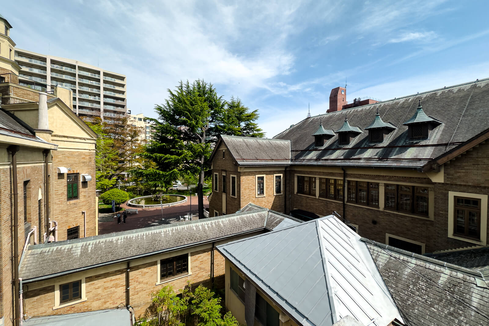Upper exterior roofline of Katakurakan seen from the rooftop walkway