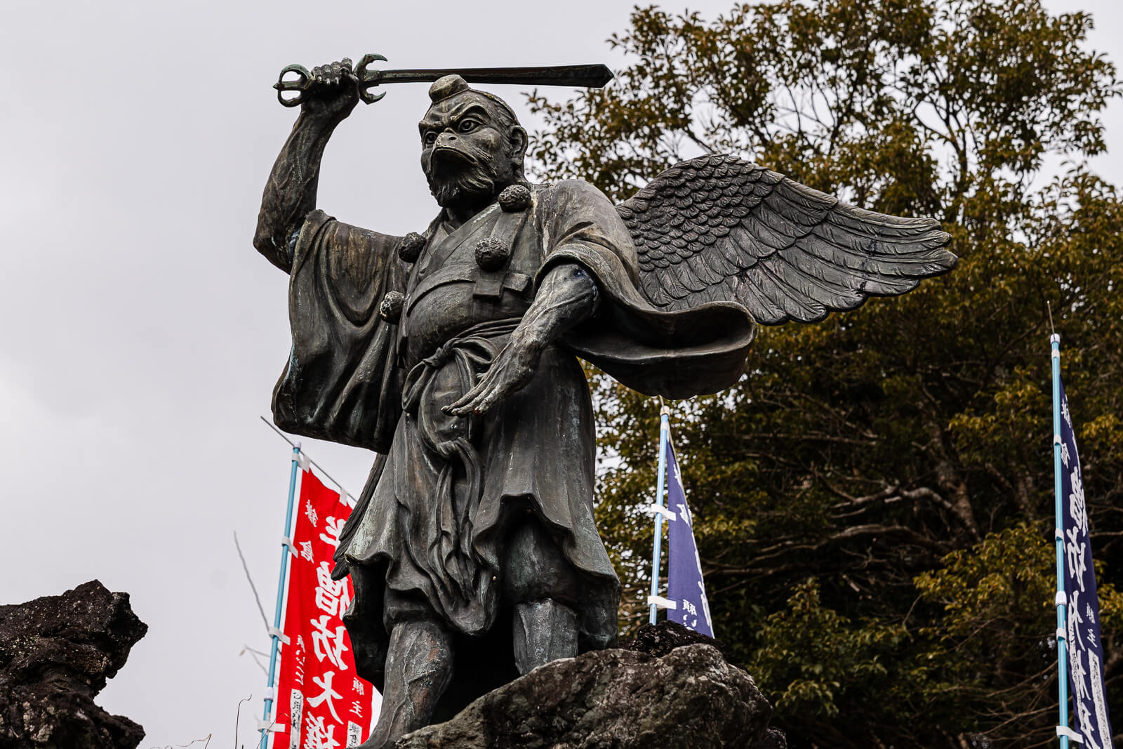 Winged Konoha Tengu statue beside the Hansobo Shrine approach at Kencho-ji Temple