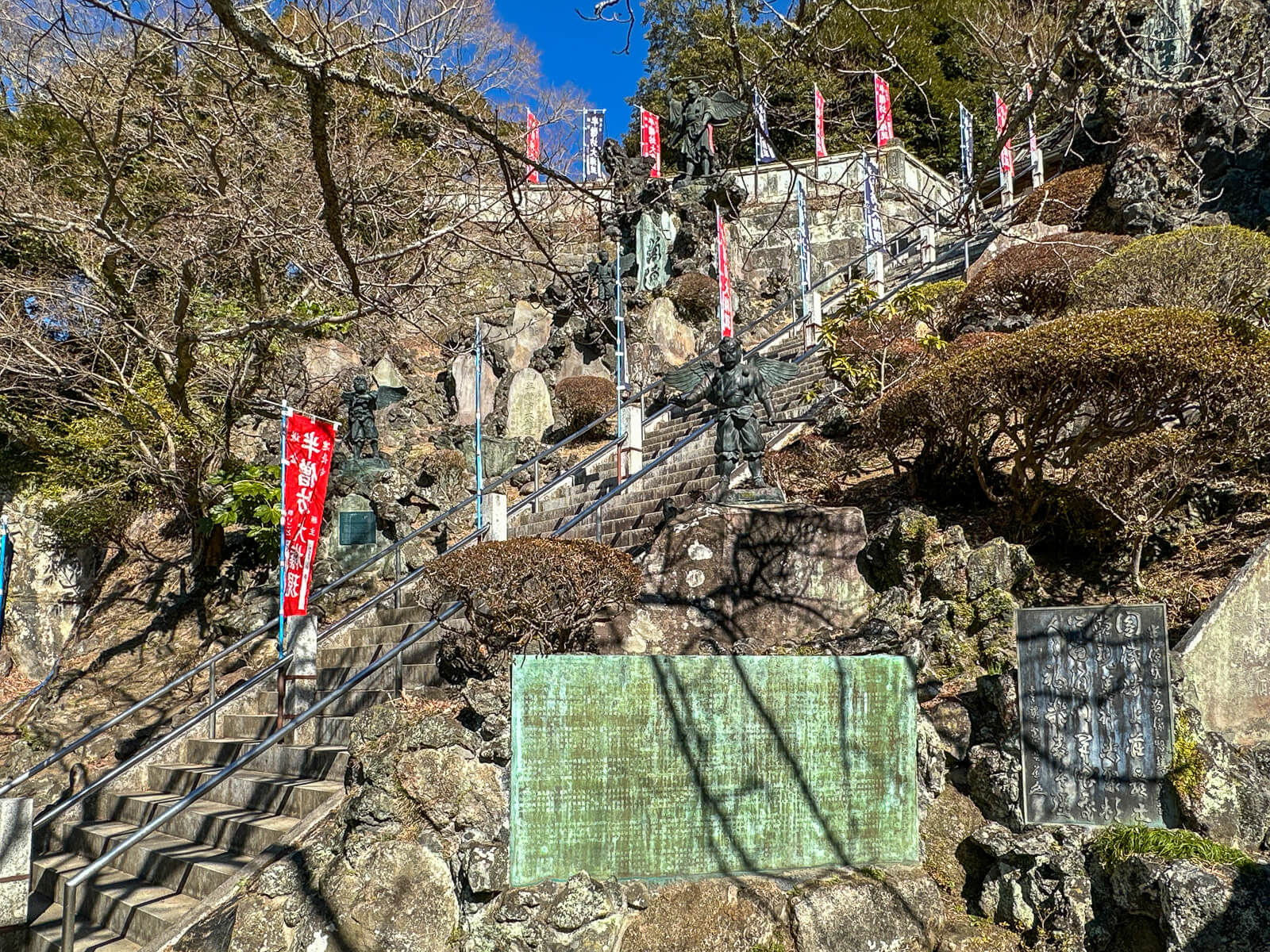 Steep stone stairway climbing through the rocky hillside just below Hansōbō at Kenchō-ji
