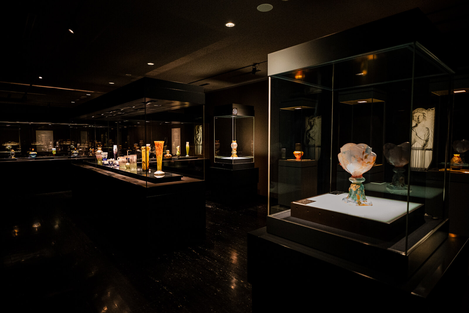Gallery display cases and sculpture exhibits inside Kitazawa Museum of Art