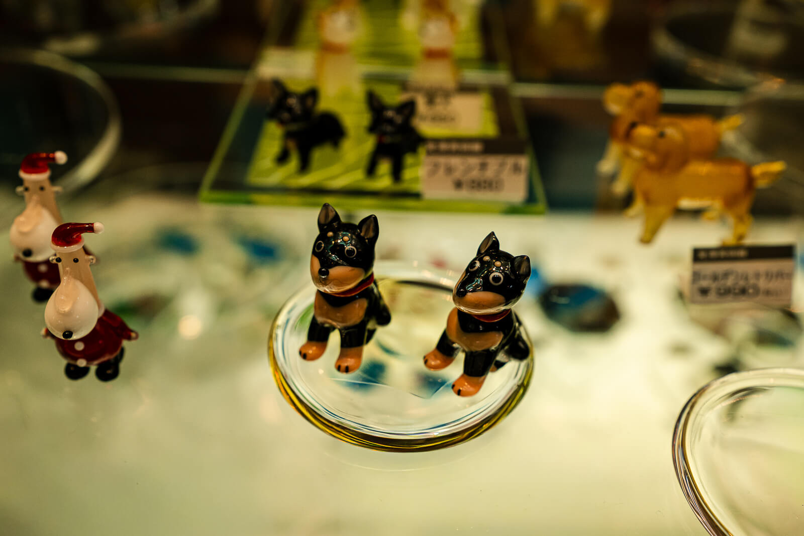 Small glass animal figurines displayed inside the gift shop at Kitazawa Museum of Art