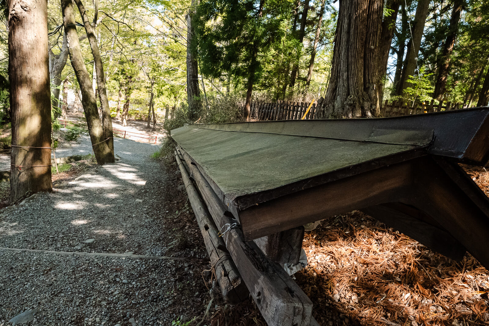 Wooden riverside structure along the path from Harumiya to Manji Stone Buddha.