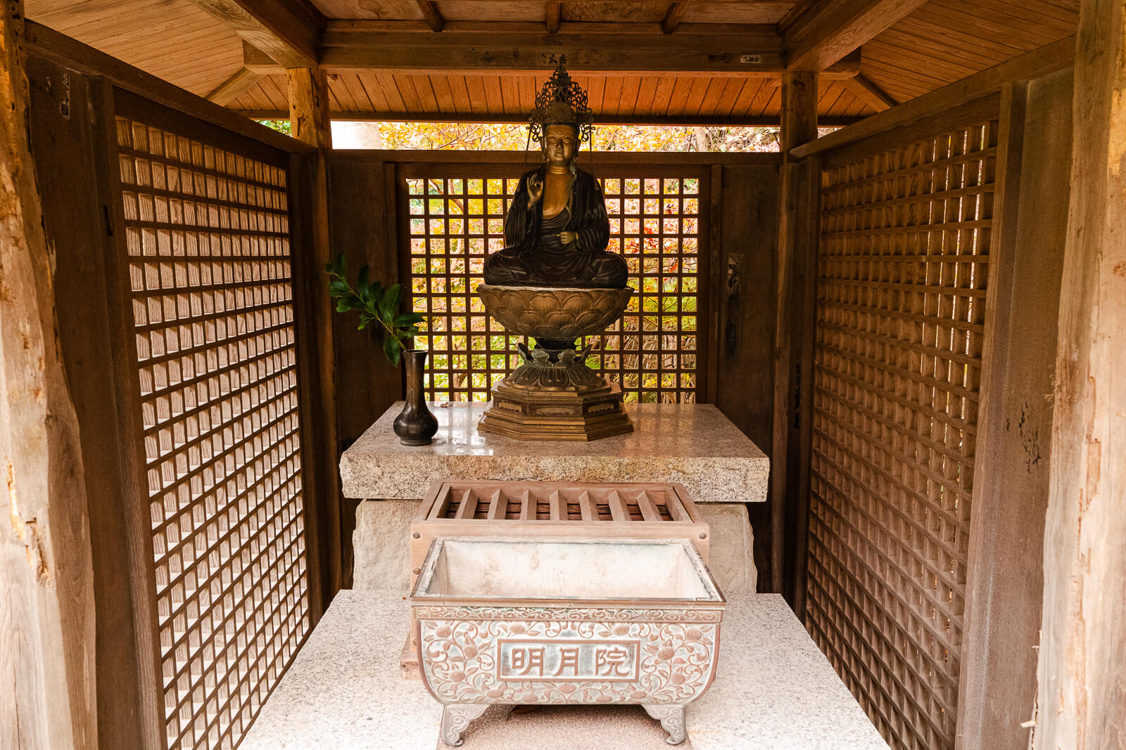 Small hokora shrine structure inside Meigetsu-in Temple in Kita-Kamakura
