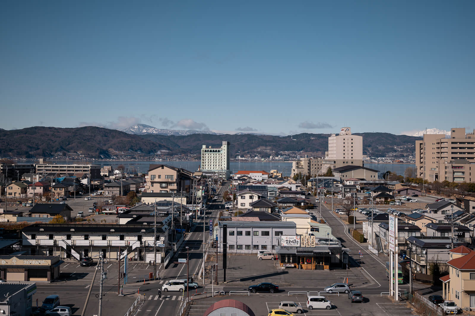 View across the Suwa basin from Takashima Castle, showing the surrounding town and landscape