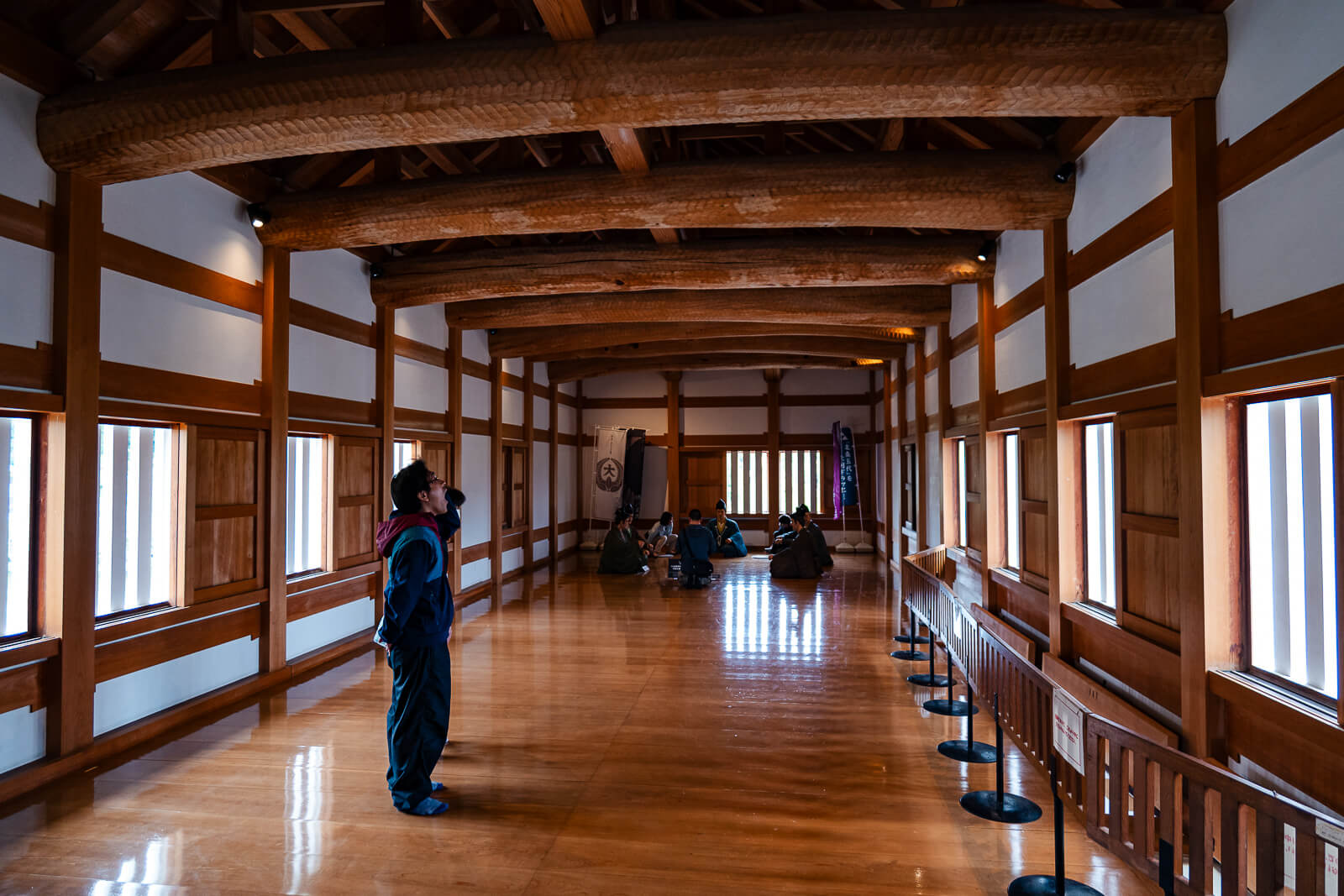 Interior wooden corridor inside a turret structure along the moat at Odawara Castle, Kanagawa