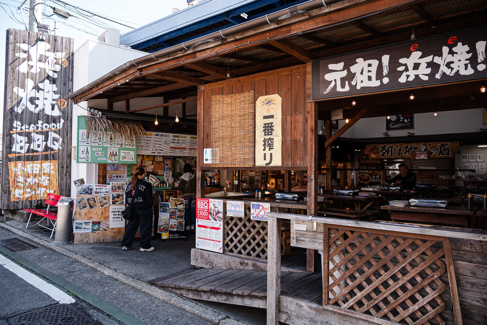Seafood restaurant storefront in Hayakawa fishing port with signage and entrance