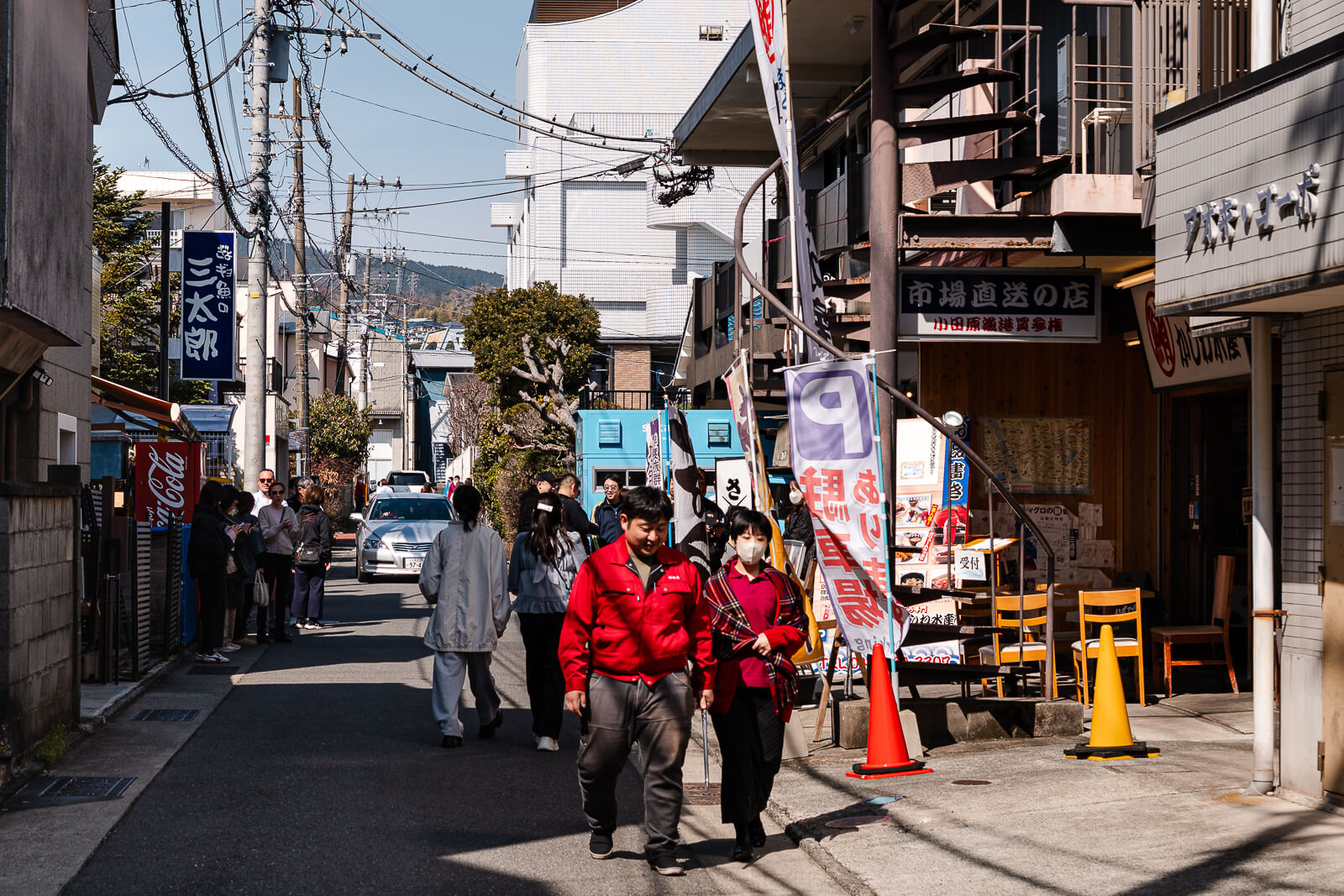 Seafood street in Hayakawa with pedestrians and storefronts