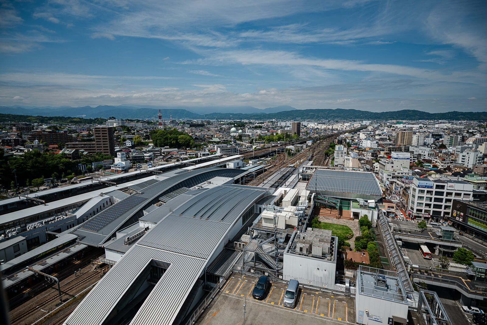 Odawara Station railway tracks and city center viewed from Minaka Odawara