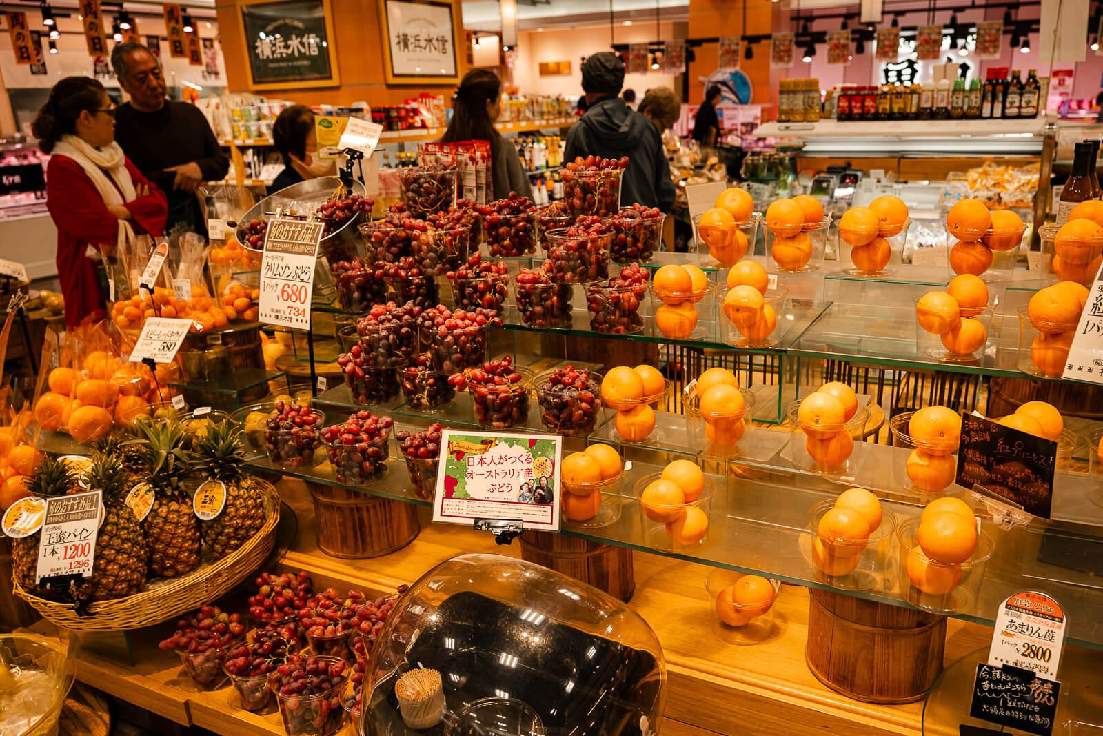 Fresh produce and local goods displayed inside a shopping area near Odawara Station