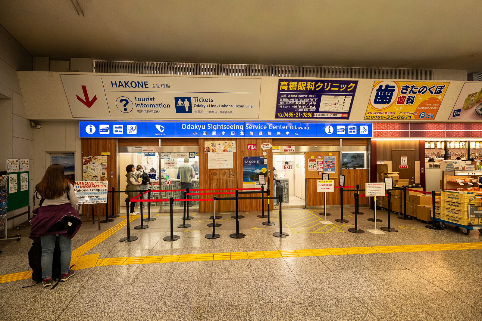 Hakone area transportation and directional signage inside Odawara Station