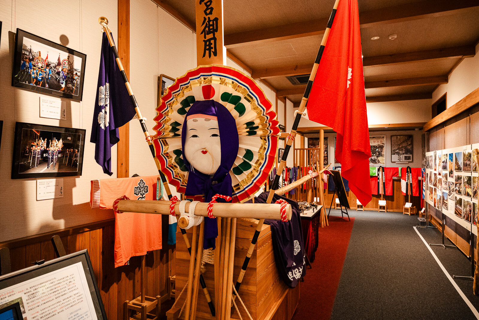Large festival display inside the Onbashirakan Yoisa Museum in Shimosuwa.