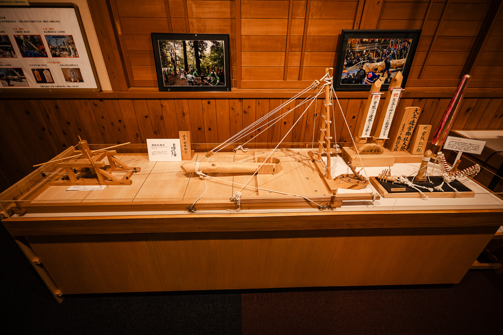 Scale model showing Onbashira log transport inside the Onbashirakan Yoisa Museum.