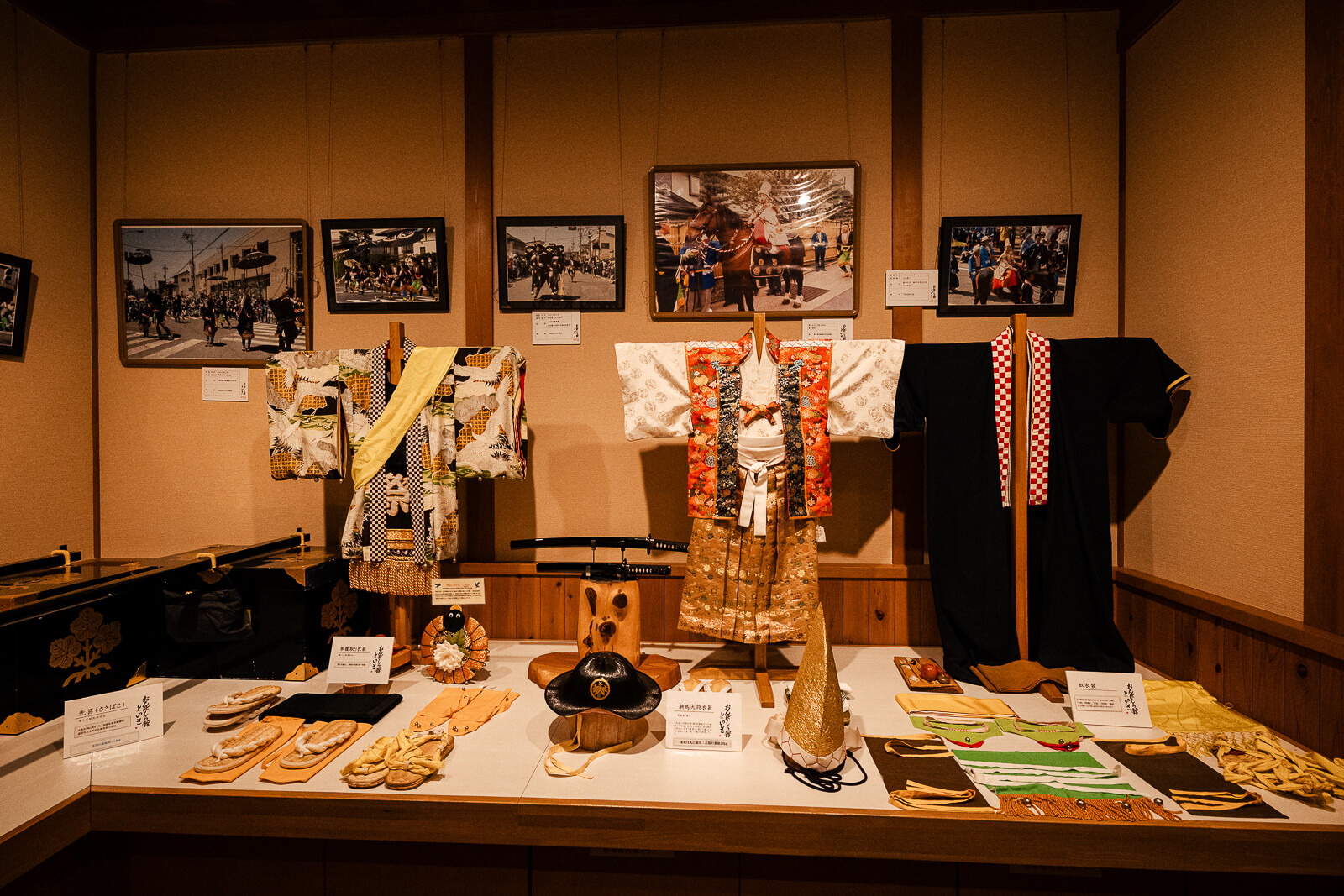 Traditional festival clothing displayed inside the Onbashirakan Yoisa Museum.