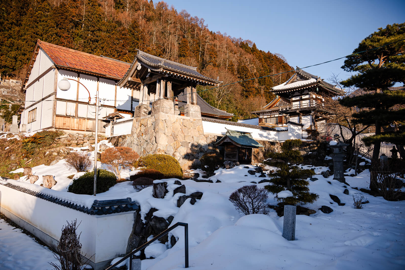 Snow-covered temple grounds at Onsen-ji Temple in Yamanouchi, Nagano