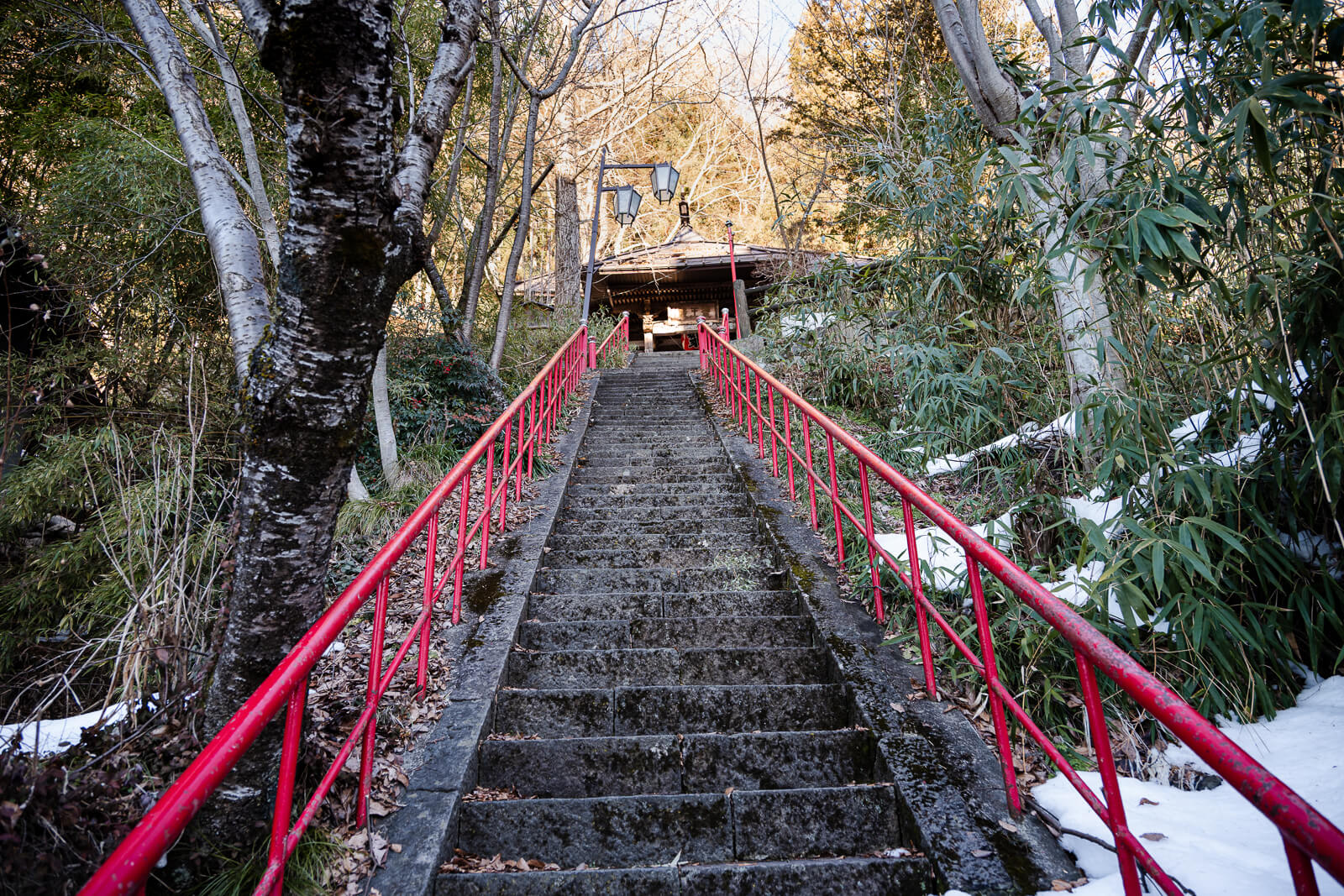 Stone stairway leading to Narita Fudoson next to Onsen-ji Temple in Yamanouchi, Nagano