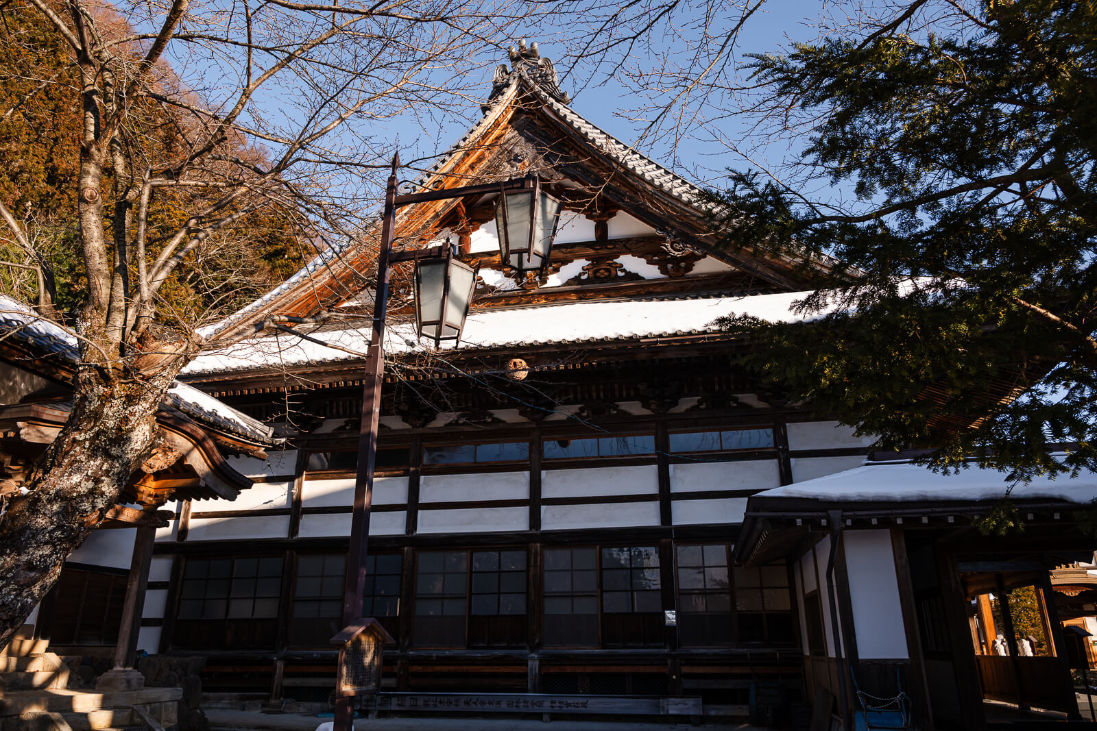 Snow-covered temple grounds at Onsen-ji Temple in Yamanouchi, Nagano