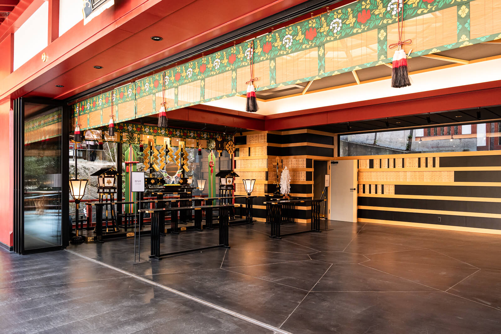 nterior worship area of Kinomiya Shrine with ceremonial decorations and offerings
