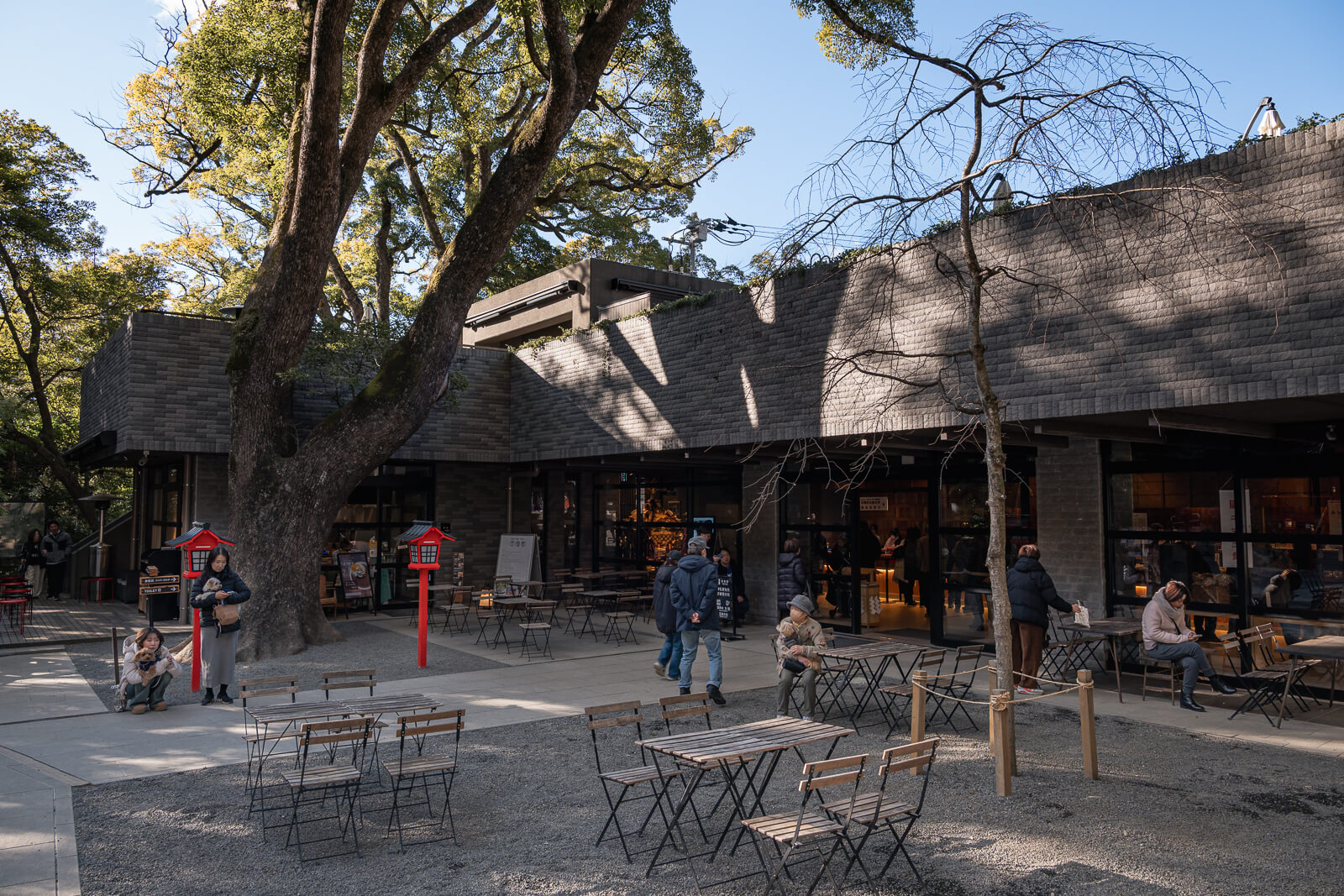 Outdoor café seating area near the shrine buildings at Kinomiya Shrine in Atami